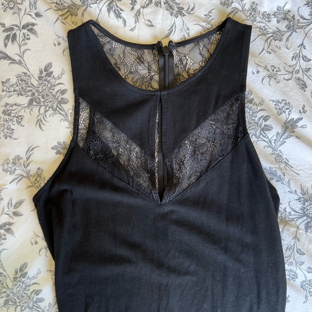 Size small Express body suit with lace detail and cut out. Full butt $15
